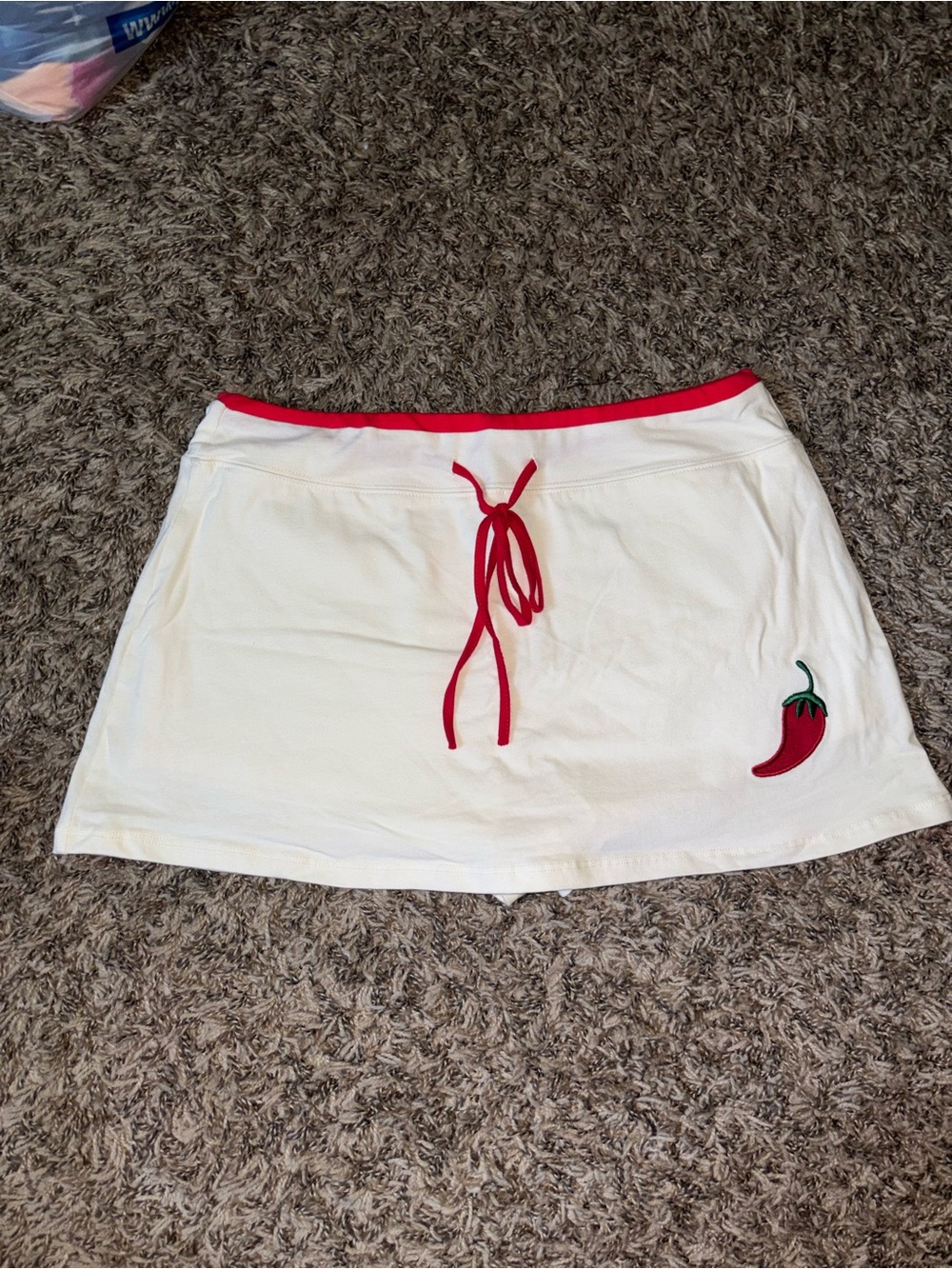 White Mini Skirt with Red Trim and Chili Patch